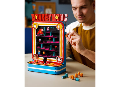 LEGO Super Mario Donkey Kong Arcade set with red and blue base, displaying pixel art game screen