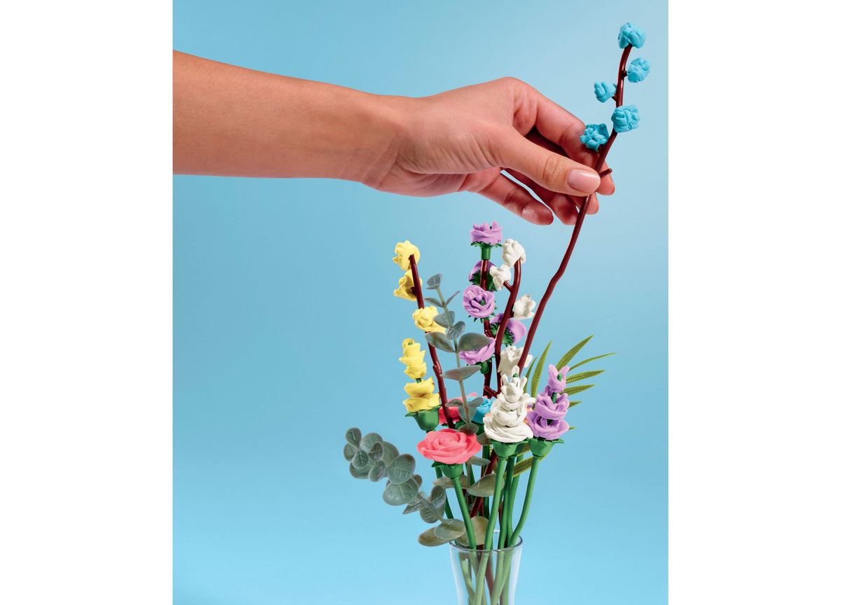 Play-Doh Blooms Wildflower Petite Bouquet Kit with colorful flowers in yellow, pink, purple, and white arranged in a ...