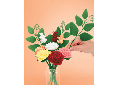 Play-Doh Blooms Rosy Petite Bouquet Kit with colorful flowers in red, pink, yellow, and white arranged in a clear vas...