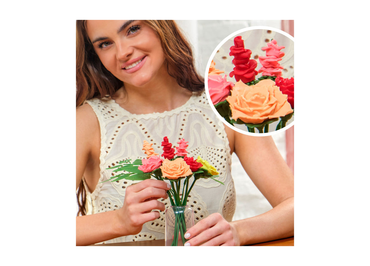 Play-Doh Blooms Rosy Petite Bouquet Kit with red, pink, and orange flowers in vase