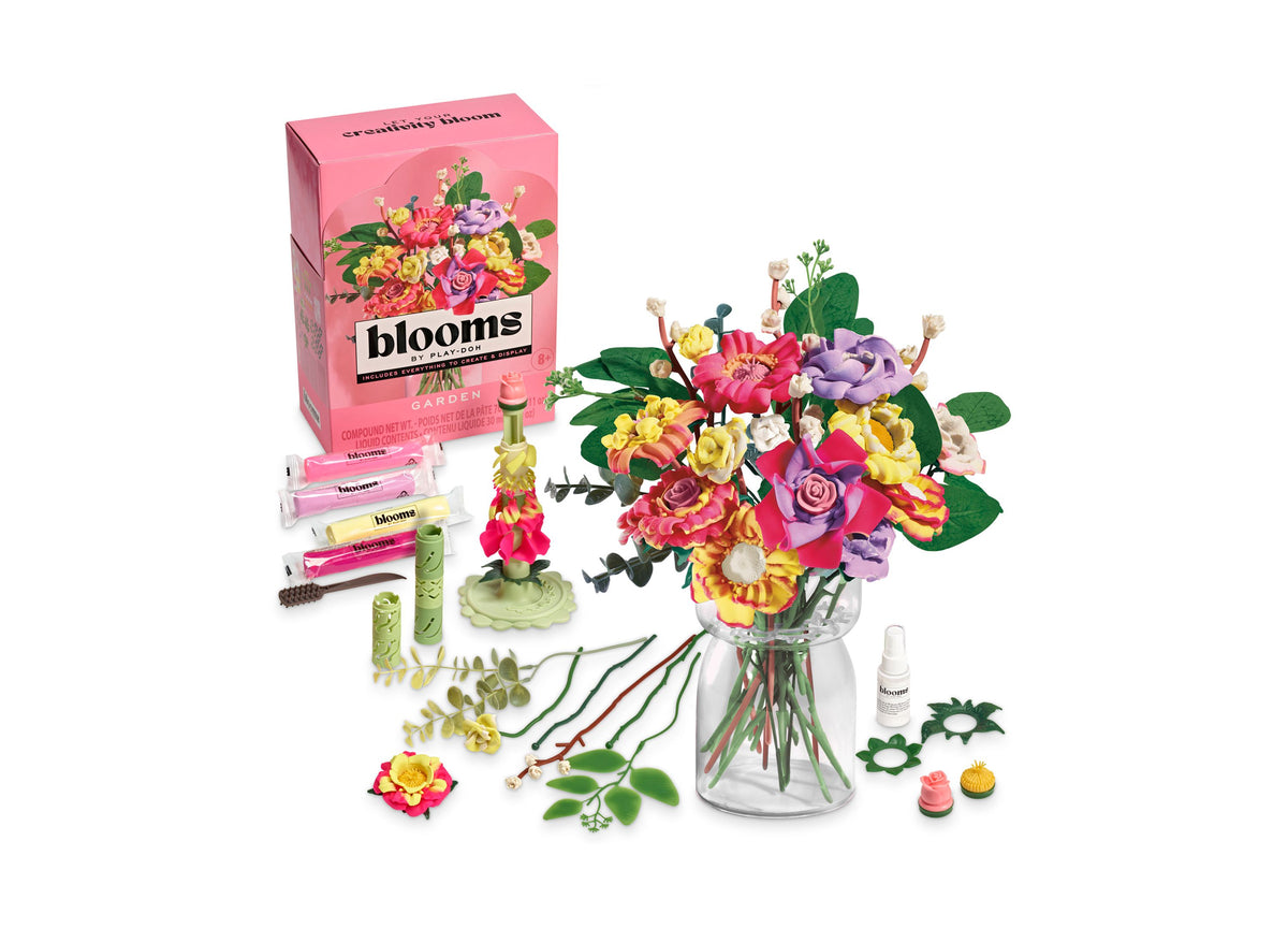 Play-Doh Blooms DIY Garden Bouquet Kit with colorful flower arrangement in clear vase, pink packaging, and craft supp...