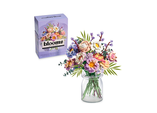 Play-Doh Blooms Meadow Bouquet Kit with colorful flower arrangement in glass vase and purple packaging box