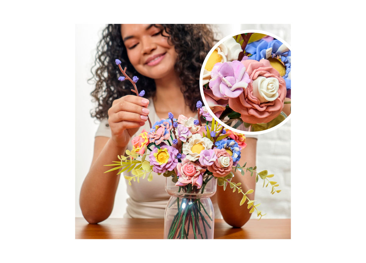 Play-Doh Blooms Meadow Bouquet Kit with colorful flowers in pink, purple, yellow, blue and cream arranged in a clear ...