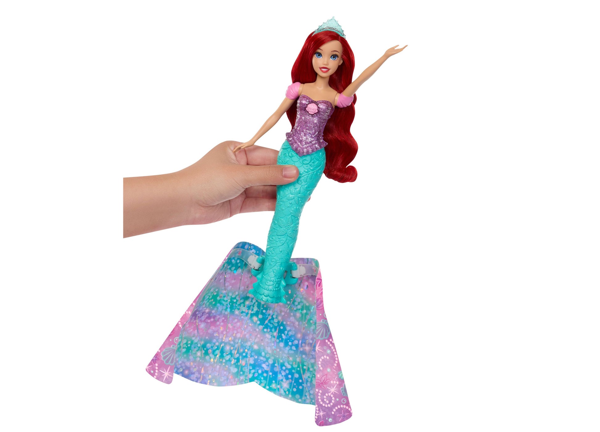 Disney Princess Transforming Ariel Fashion Doll with red hair, purple sequin top, turquoise tail, held in hand