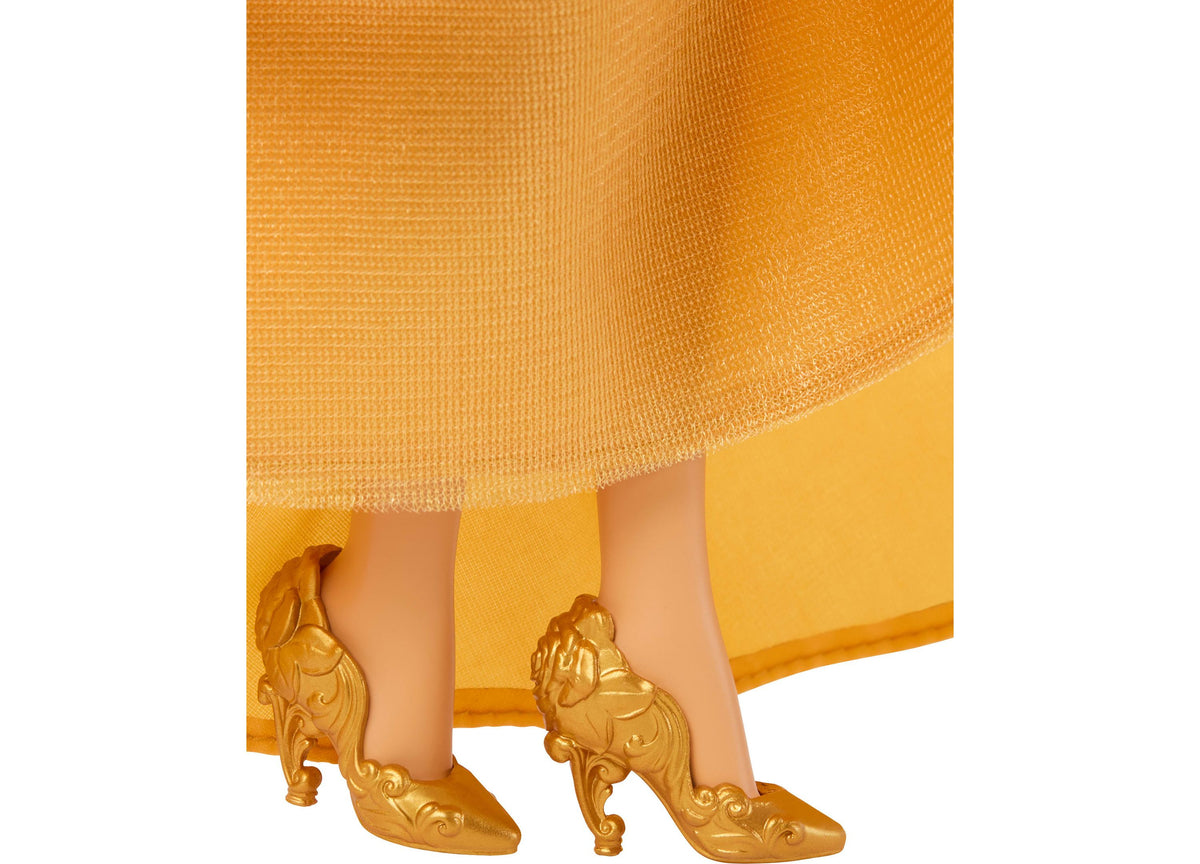 Disney Princess Belle doll wearing yellow gown with gold ornate heels and accessories