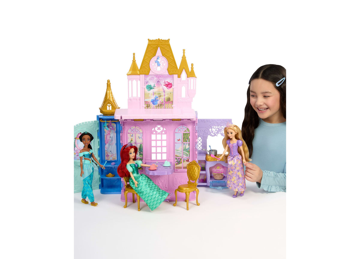 Disney Princess Rapunzel Close & Carry Castle playset with pink castle, golden towers, Rapunzel doll with long hair, ...