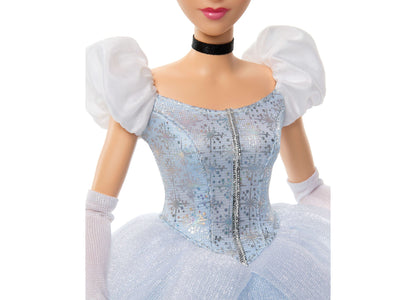 Disney Princess Sparkling Princess Cinderella doll wearing blue sequined gown with white puffed sleeves and black choker