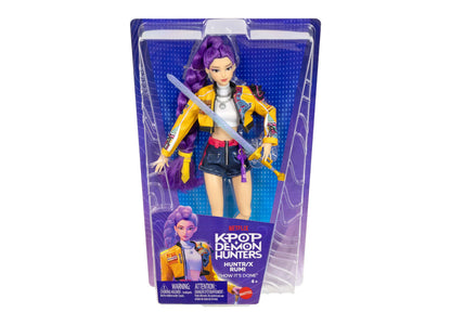 KPOP Demon Hunters Huntr/X Rumi 11" doll with purple hair, yellow jacket, and sword weapon accessory