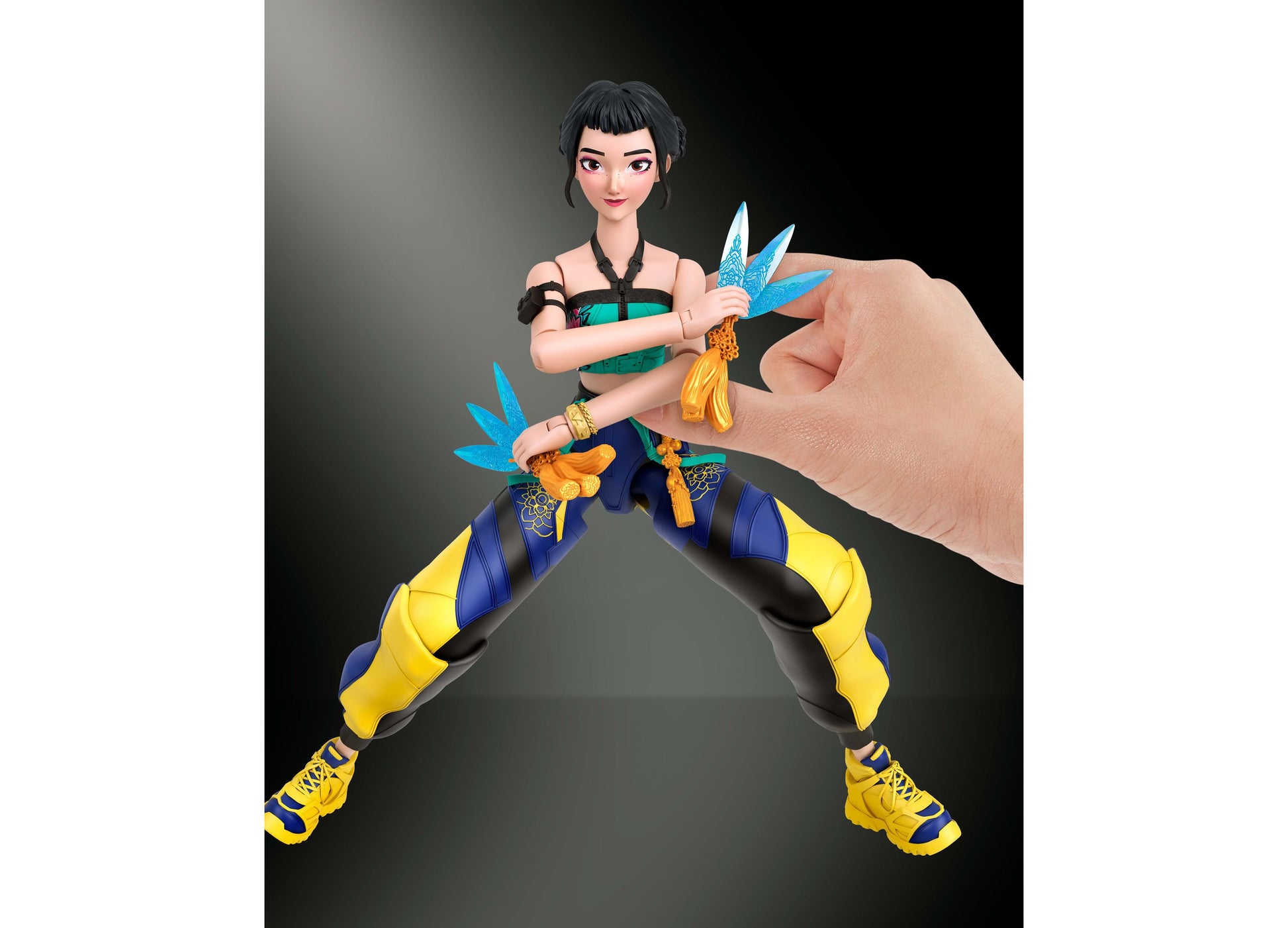 Kpop Demon Hunters Zoey action figure with blue wings, yellow and blue outfit, swappable accessories