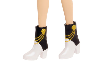 Kpop Demon Hunters Mira Huntr/X doll wearing black and white boots with gold chain details