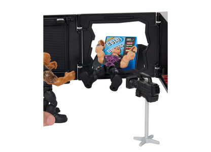 WWE The Rock Knuckle Crunchers Final Boss 2-in-1 Microphone Playset with action figure in black and purple outfit ins...