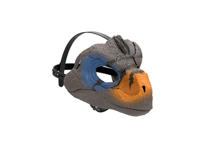 Jurassic World Snarlin' Sounds Velociraptor mask with gray textured head, blue eye area, orange jaw, and black adjust...