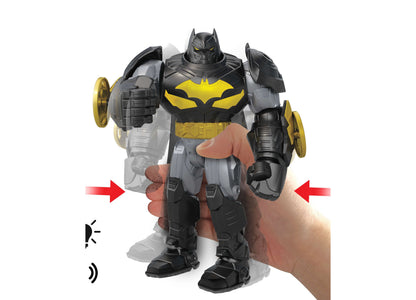 DC Comics Batman Mech Suit action figure with yellow and black armor, held in hand, featuring battle discs