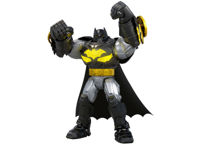 DC Comics Batman Mech Suit action figure in black, gray, and yellow armor with raised fists and battle dis...