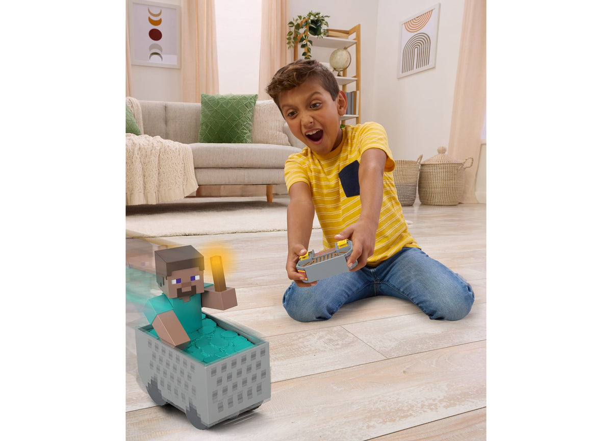 Child in yellow striped shirt operating Minecraft Minecart RC vehicle with remote controller on light wood floor