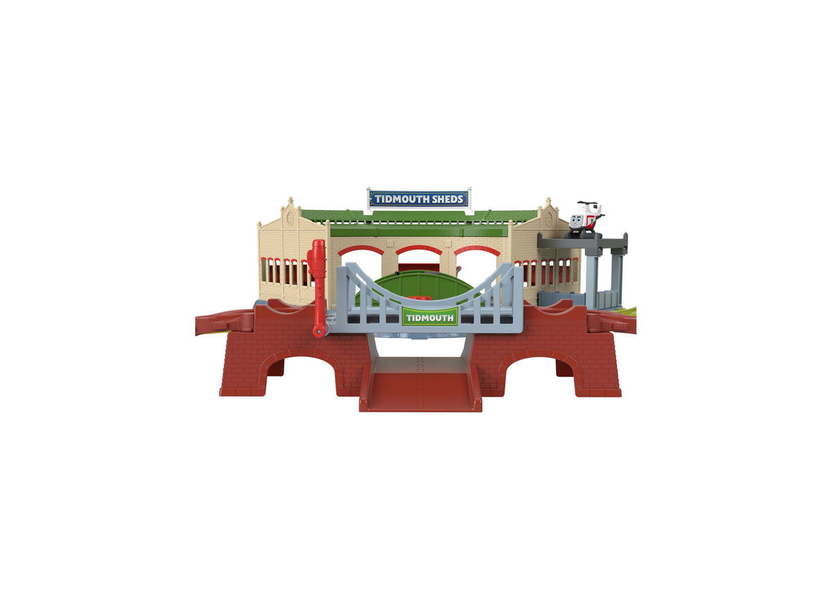 Thomas & Friends Explorin' Tidmouth Sheds playset featuring red brick station building with green roof, turntable, cr...