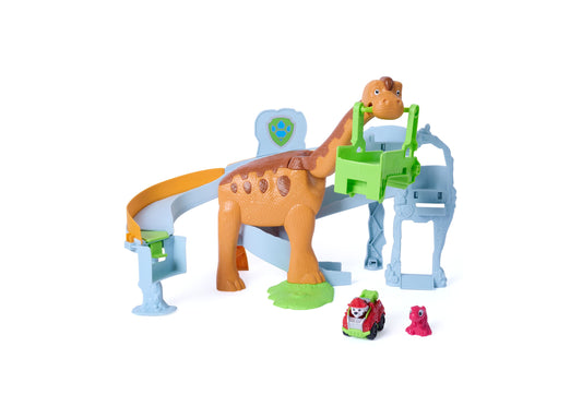 Paw Patrol Dinosaur Lift & Race Playset with brown dinosaur, green ramps, blue tower, and red vehicle