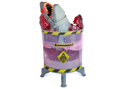 Primal Hatch Megalodon toy with lights and sounds in purple tank with yellow warning stripes