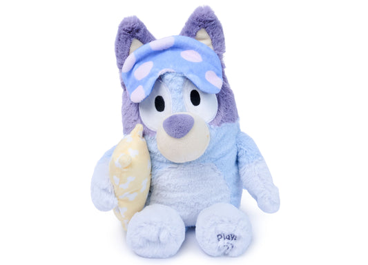 Bedtime Bluey 13 inch plush toy in blue with sleep mask, holding pillow
