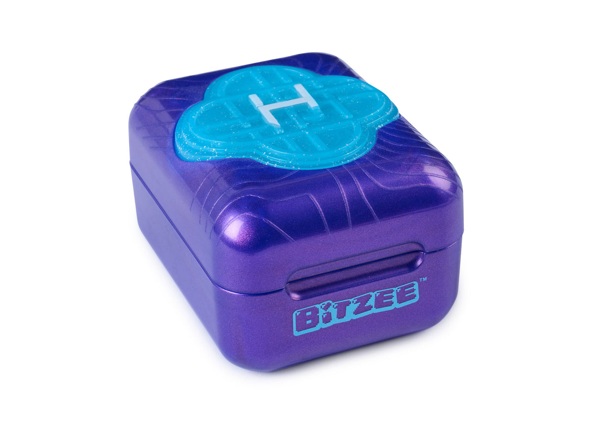 Bitzee KPop Demon Hunters purple holographic interactive digital pet pod with turquoise top