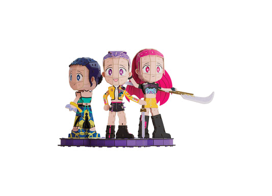 Spin Master 4D Build KPOP Huntrix Chibi Set featuring three colorful chibi character figures standing on a purple base