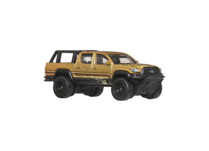 Matchbox 1:64 scale die-cast Toyota 4Runner pickup truck in gold and black desert chase design
