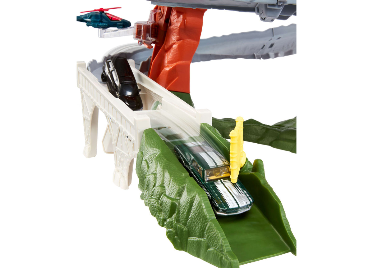 Matchbox 1:64 Scale Helicopter Escape Playset with red helicopter, white bridge, and die-cast car