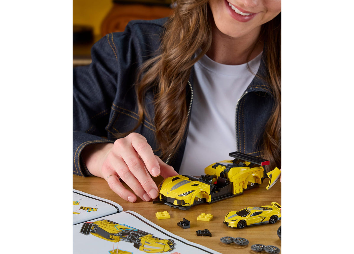 Building a yellow Corvette C8.R model car with brick pieces and customization parts