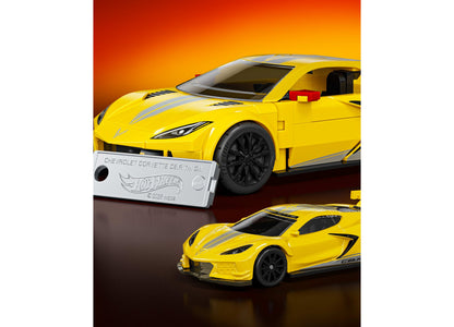 Yellow Chevrolet Corvette C8.R building set with assembled 1:32 scale model featuring open door, matching 1:64 metal ...