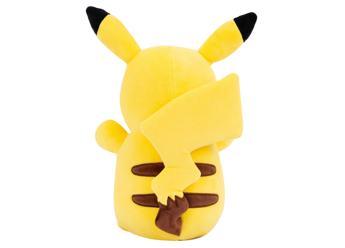 Pokemon HugMee Pikachu 10" Plush toy in bright yellow with black-tipped ears, closed eyes, and brown mouth detail