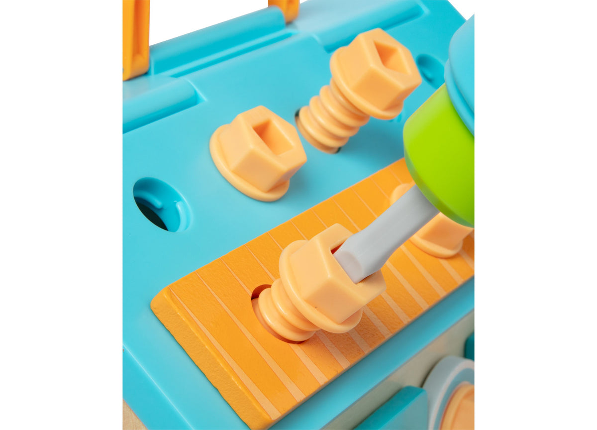 Melissa and Doug Build A House Toolbox set with orange house pieces, blue toolbox, and mechanical drill tool