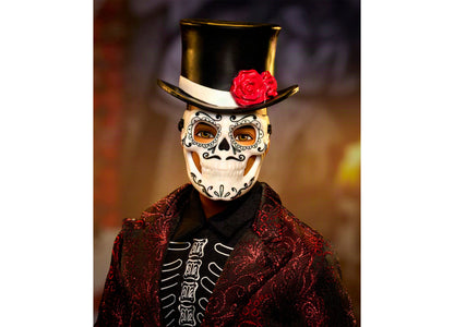 Barbie Día De Muertos Ken doll wearing skull mask, black top hat with red rose, and red glittery jacket with skeleton...