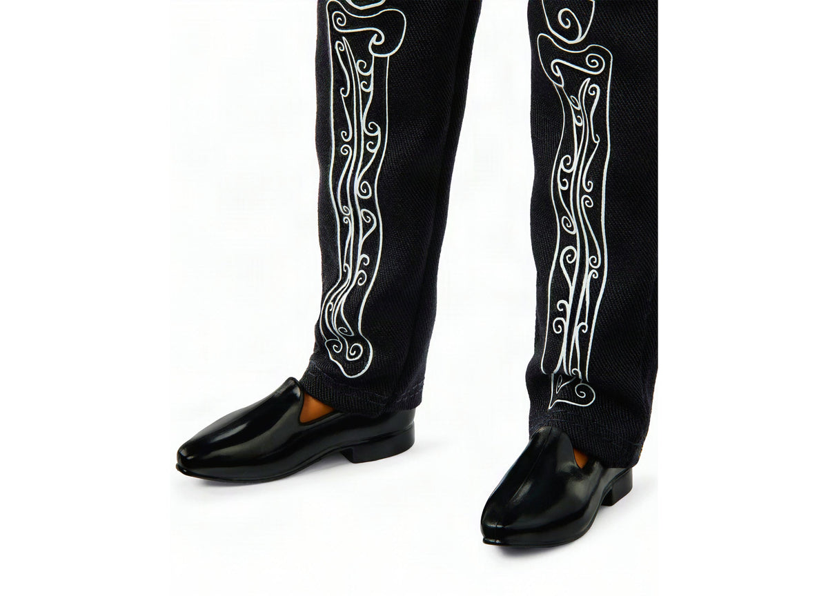 Barbie 2026 Día De Muertos Ken doll wearing black jacket with white skeleton embroidery and black shoes