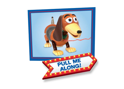 Toy Story Slinky Dog Pull Toy with orange body, yellow snout, floppy ears, green collar, and coiled midsection on blu...
