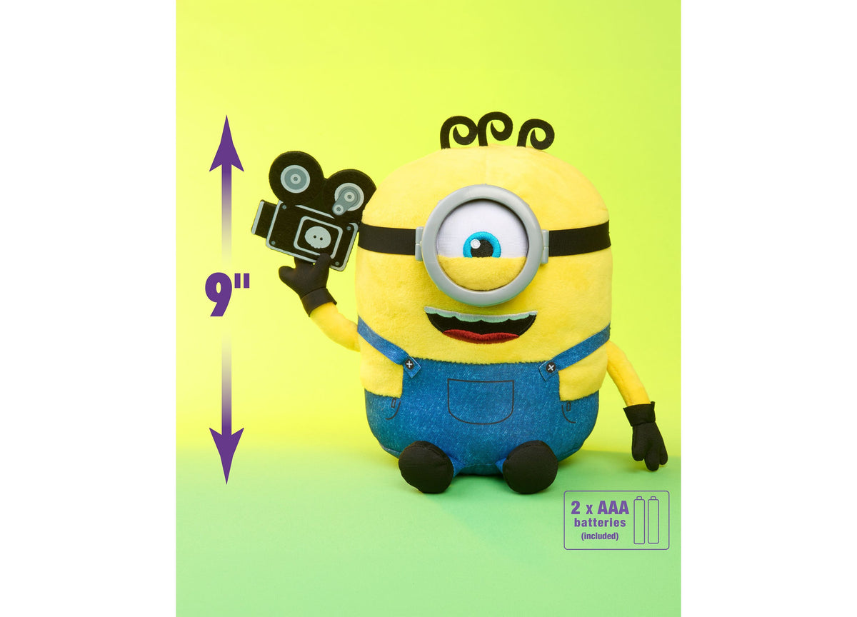 Minions Interactive Babbling James 9" Plush toy with one eye, blue overalls, holding a movie camera