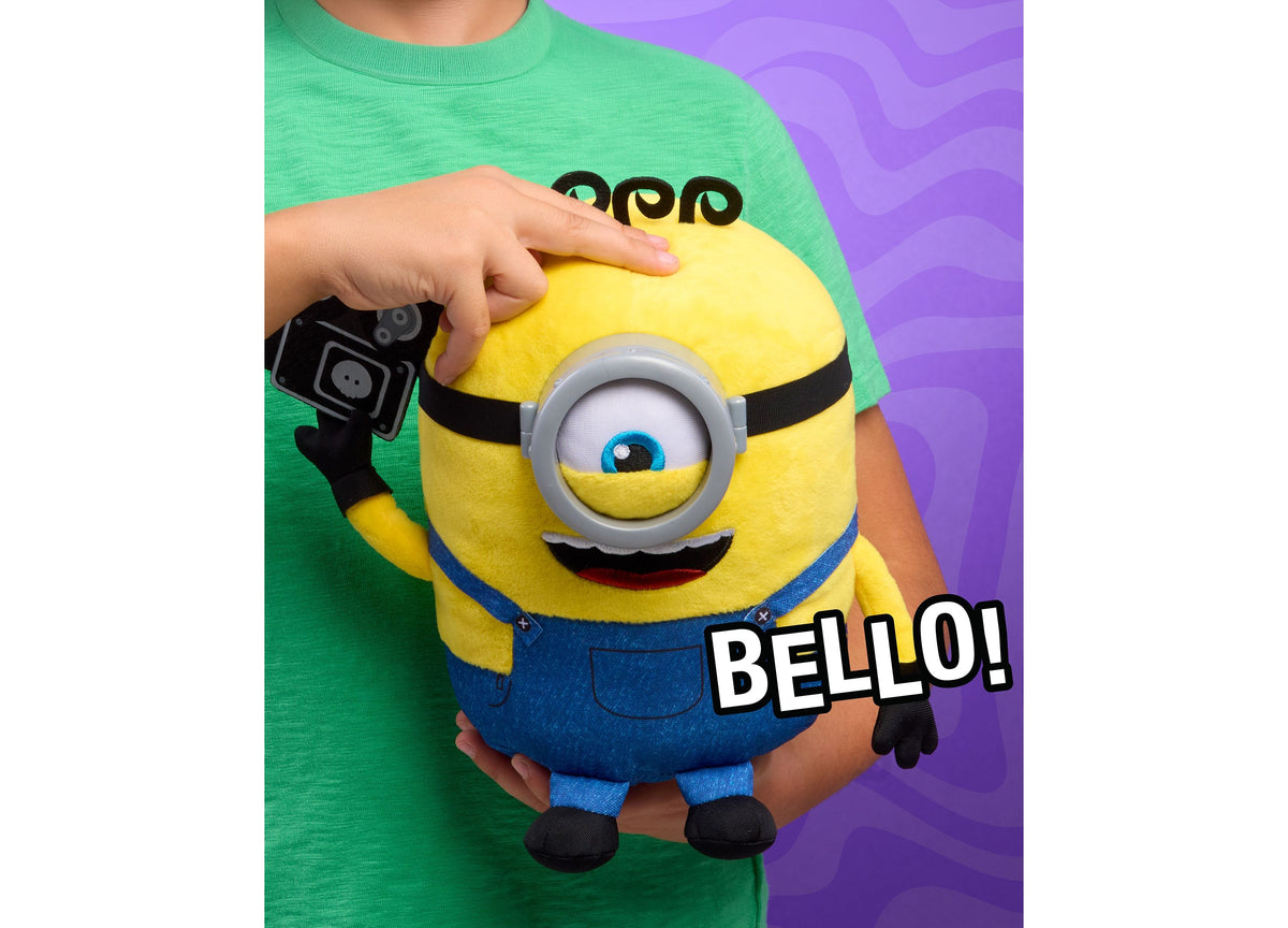 Minions Interactive Babbling James 9" Plush yellow character with one eye, held by child wearing green shirt