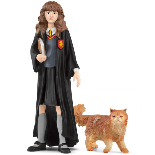 Hermione figurine wearing black wizard robes with house crest, holding wand, standing with orange Crookshanks cat figurine