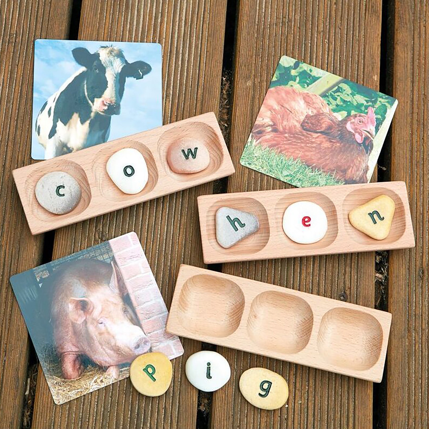 Wooden Word Building Tray with beech wood construction and letter tiles spelling farm animal words