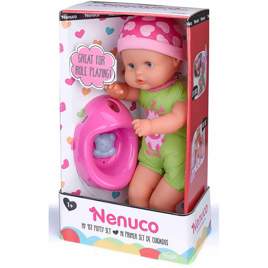 Nenuco My 1st Potty Set doll in packaging with green outfit, pink polka-dot hat, and bright pink potty chair accessory