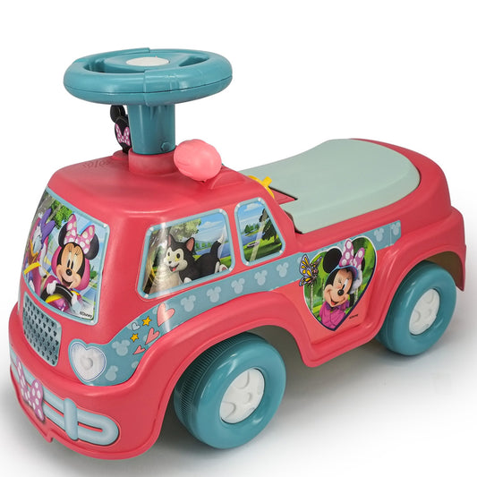 Red and teal ride-on camper vehicle with Minnie Mouse graphics, steering wheel, seat, and white wheels