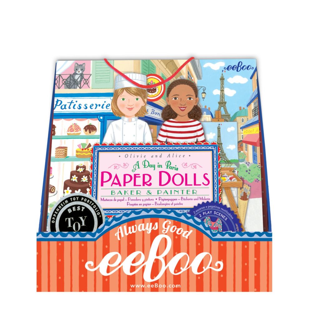 A Day in Paris Paper Dolls Baker & Painter set by eeBoo featuring two illustrated girl dolls, a Parisian bakery storefront scene, and accessories on the packagi