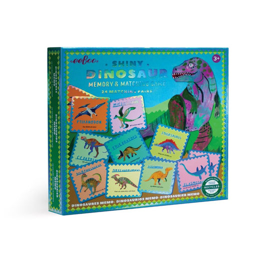 eeBoo Shiny Dinosaur Memory and Matching Game box featuring colorful dinosaur illustrations and cards on bright turquoise background, 24 matching pairs, ages 3+