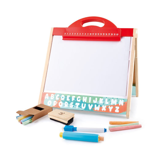 Wooden double-sided easel with red handle and ruler, whiteboard on front, alphabet strip below, includes markers, colored pencils, and stamp accessories