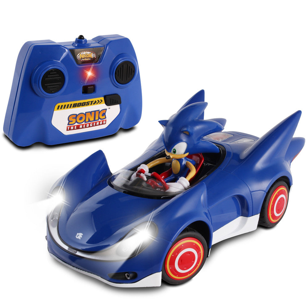 Blue Sonic the Hedgehog R/C racing car with opening doors and Sonic figure in cockpit, shown with matching blue remote control