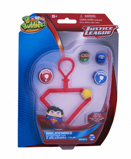 Bbuddieez DC Justice League starter kit packaging with red clip connector, five small character figures including Superman and Batman, and two secret reveal but