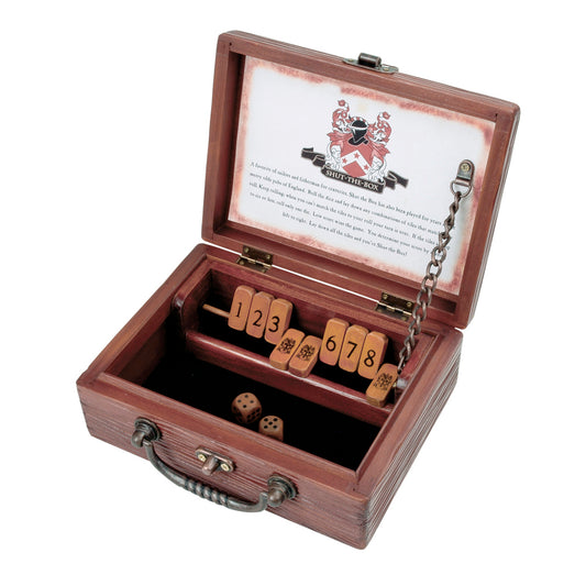 Shut the Box classic dice game in open wooden box with numbered tiles 1-8, two wooden dice, and instruction card inside
