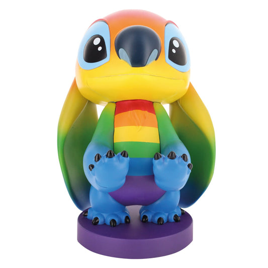 Rainbow Stitch figurine with yellow head, blue face, multicolored striped torso, blue arms and legs with dark claws, standing on purple base
