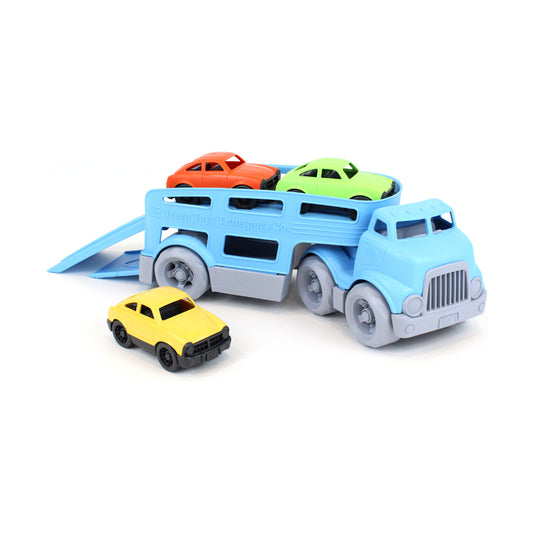 Blue toy car carrier with ramp holding orange and lime green cars on top, yellow car positioned in front