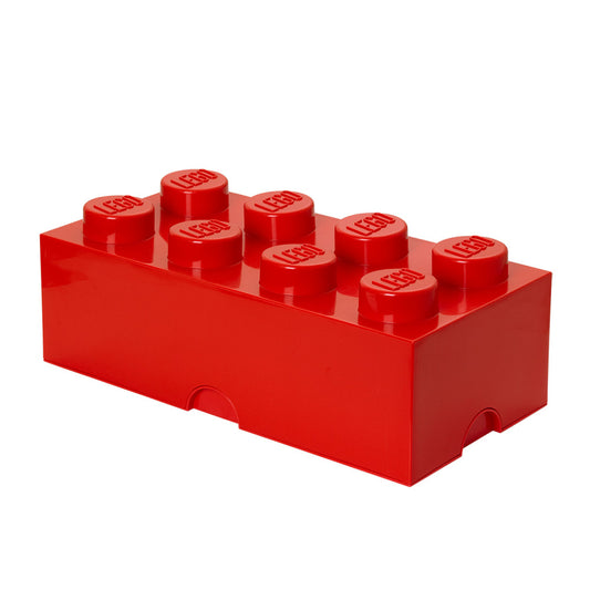 Bright red LEGO storage brick with eight studs on top and hinged lid on plain background