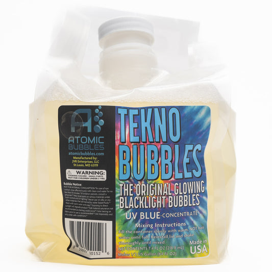 Atomic Bubbles Tekno Bubbles UV glowing blacklight bubble refill concentrate in yellow liquid, 7.1 fl oz bottle with gray cap wrapped in clear plastic